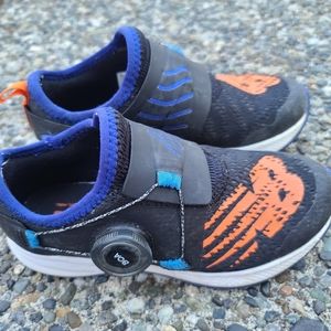 Little boys New Balance size 12 black blue orange